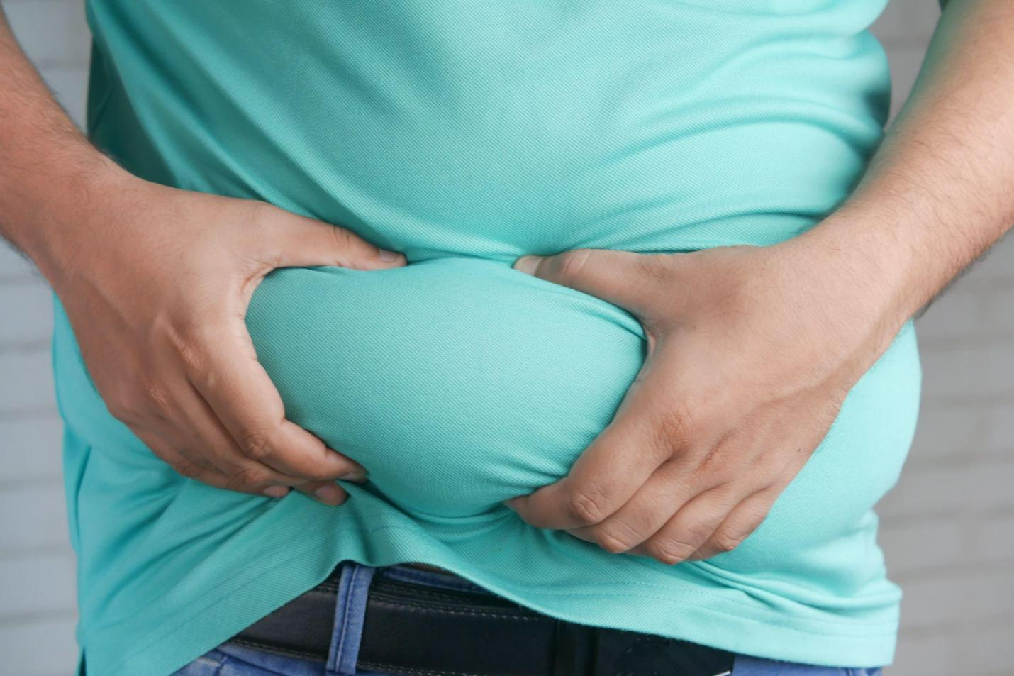 A person holding their stomach