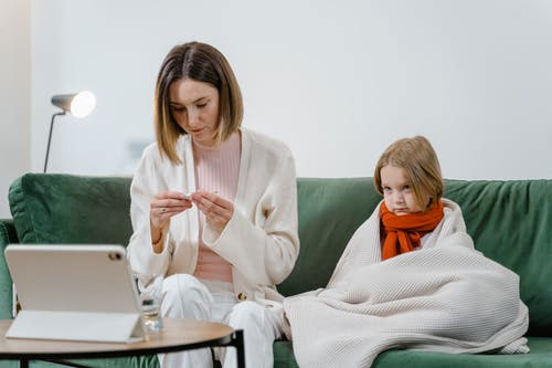 A mother taking online doctor consultation services in North Dakota