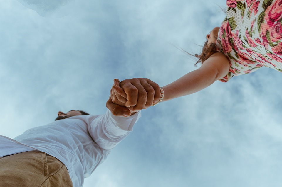 A couple holding hands