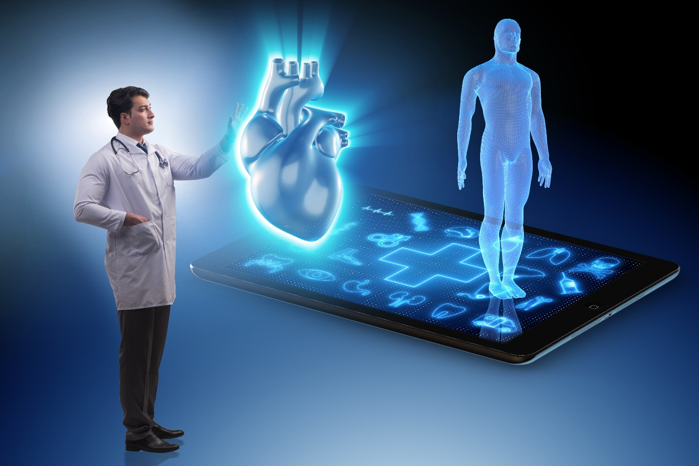 A doctor looking at a hologram of a human heat