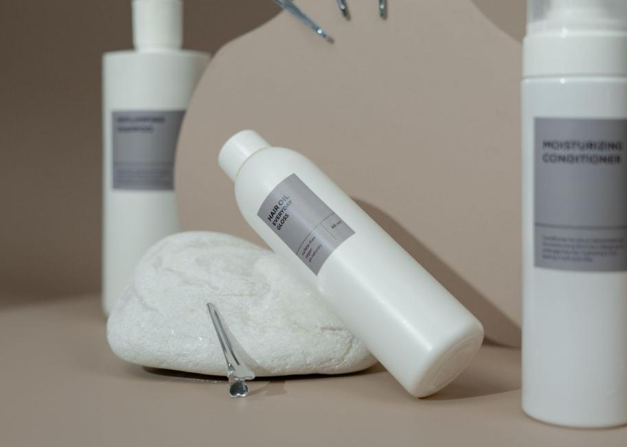 Hair care bottles with brown background