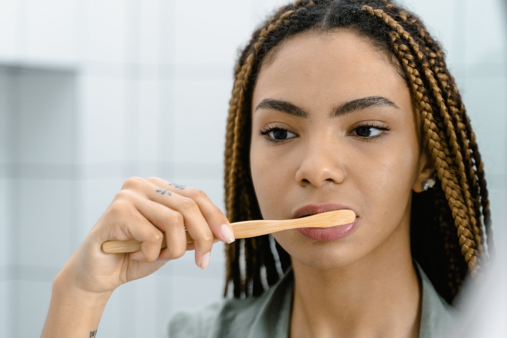 Woman brushing her teeth