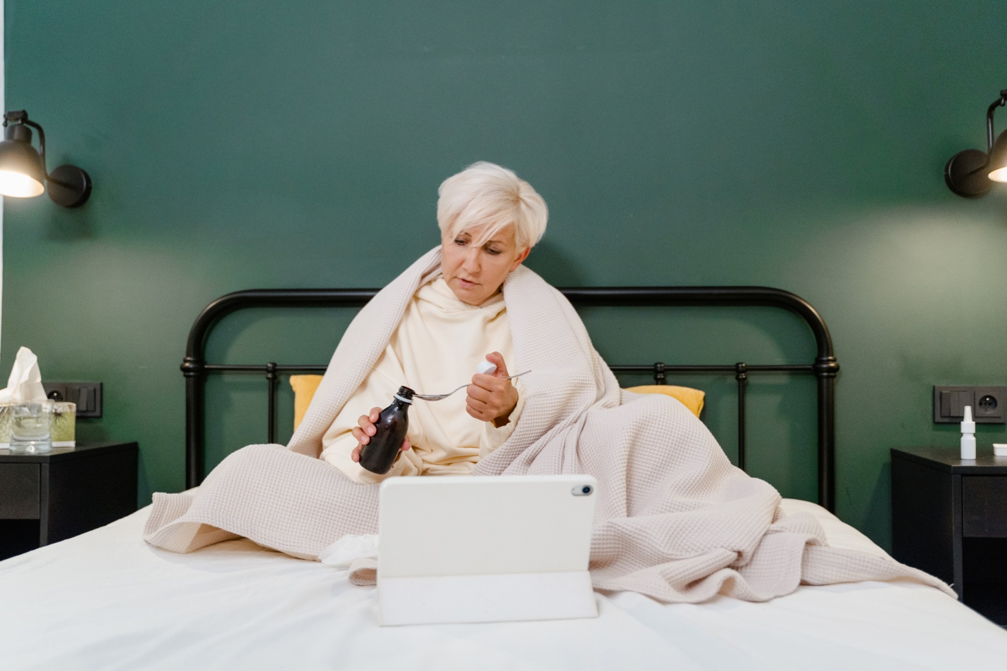 A sick woman consulting an online doctor