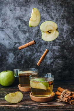 cups filled with apple cider vinegar