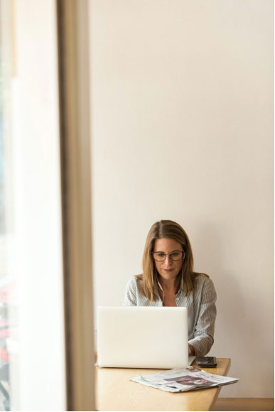 a doctor speaking to their patient online 