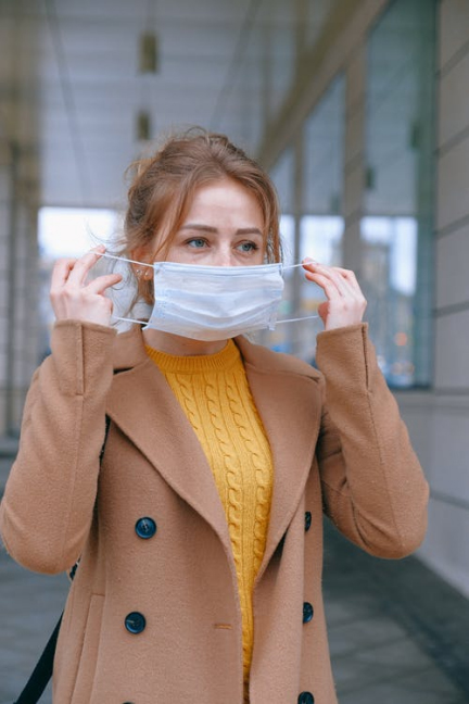 a woman wearing a face mask