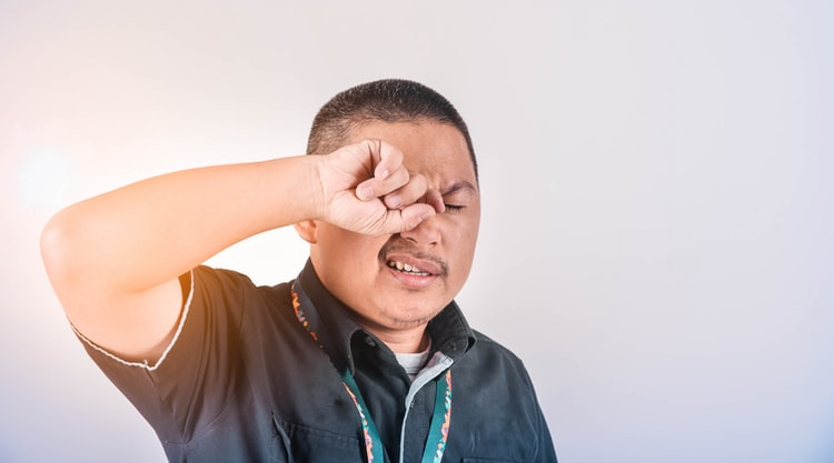 A man with pink eye