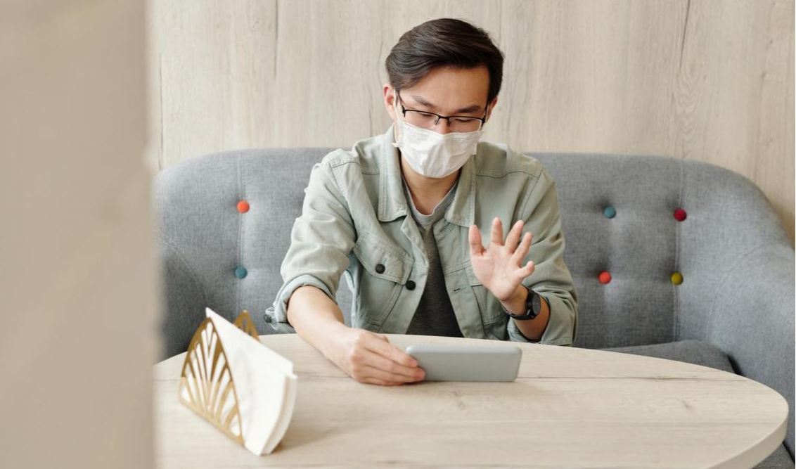 Man taking a virtual doctor appointment for sinus infection