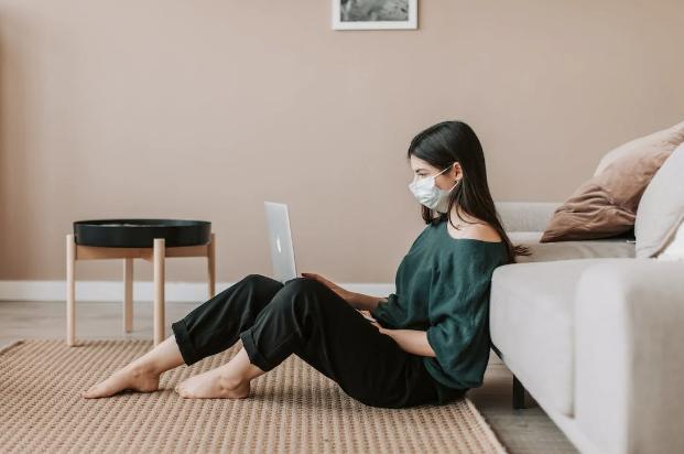 Woman getting an online consultation from TelMDCare. 