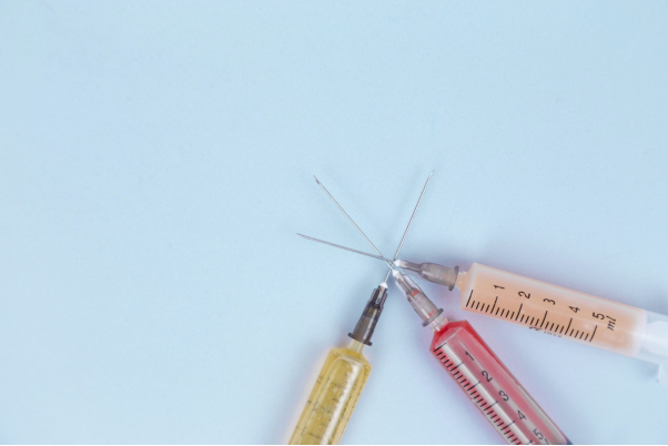Syringes with different colored fluids