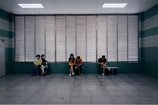 People sitting in a hospital’s waiting room