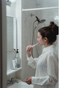 Woman brushing her teeth
