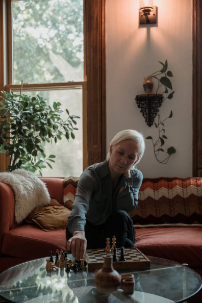 A woman witting on a couch 