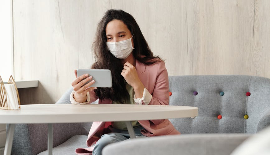 A woman during a virtual gynecologist appointment